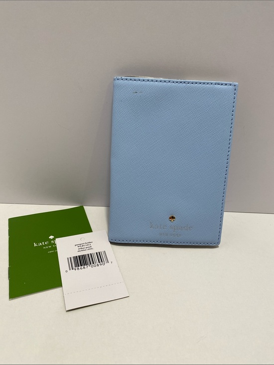 kate spade Accessories - kate spade light blue passport cover. NWT. Flaw on front